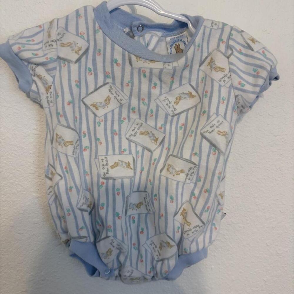 Peter Rabbit blue and white striped baby romper with small illustrations of